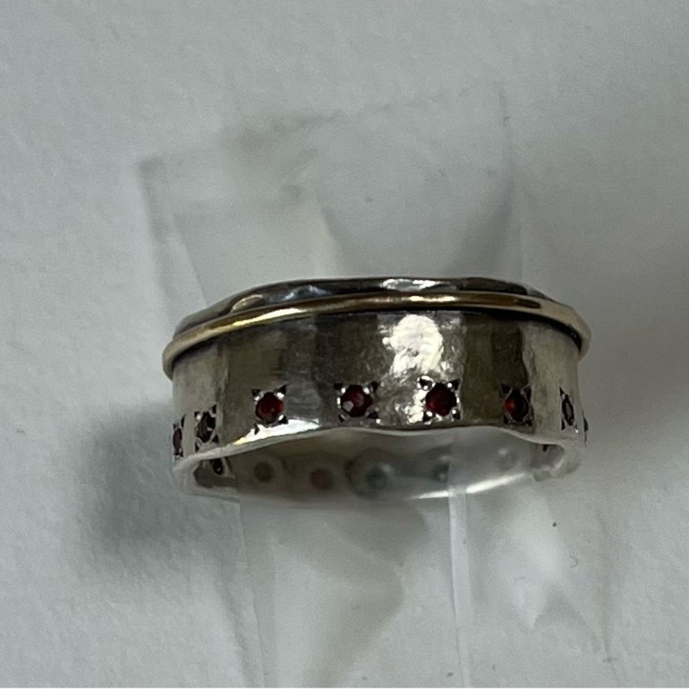 Elegant Silver and Gold Ring with Red Accents